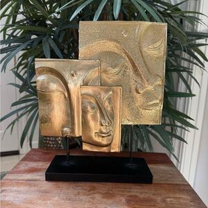 Golden Meditation Buddha Faces Sculpture.